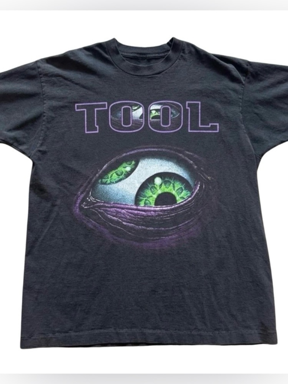 Black Graphic Band Tee with Green Eye Design